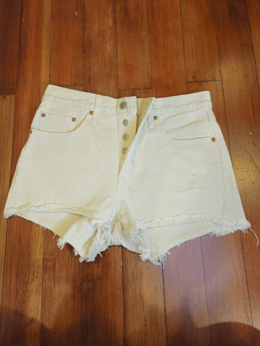 Levi's Cream Frayed Denim Shorts